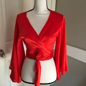 Red silky wrap blouse